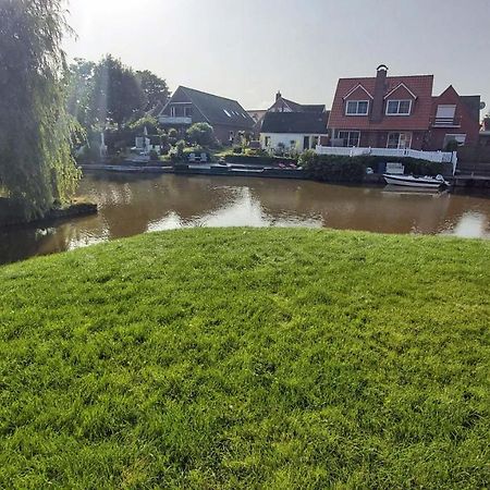 Grachtendroeoem Greetsiel Kültér fotó